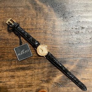 August Steiner 14k gold watch